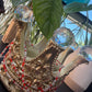 Red tie on waistbeads